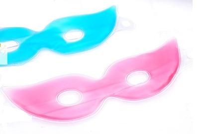 Masques d'oeil roses ou bleus de gel pour des yeux au beurre noir et des rides